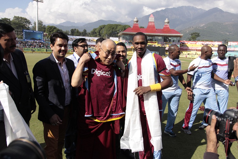 West Indian Captain Dwayne Bravo and Tibetan Buddhists Dalai Lama in Tamil