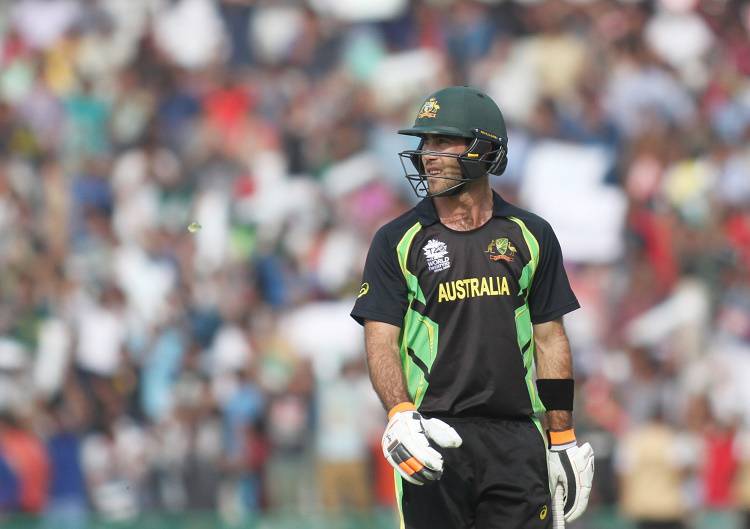 Glenn Maxwell of Australia walks back to the pavilion in Tamil