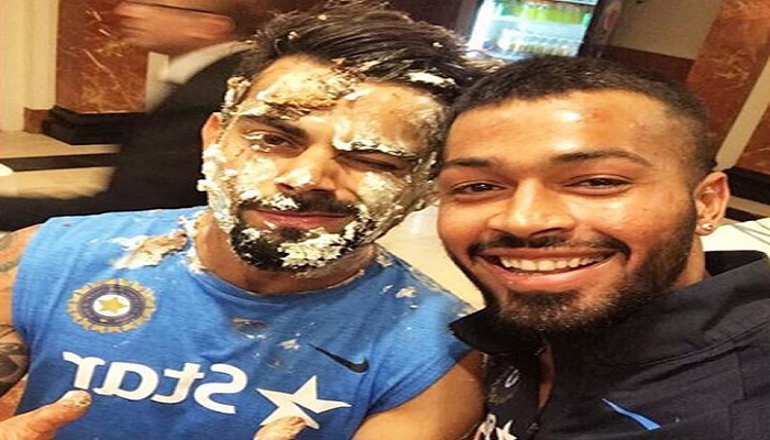 Hardik pandya with kohli Image