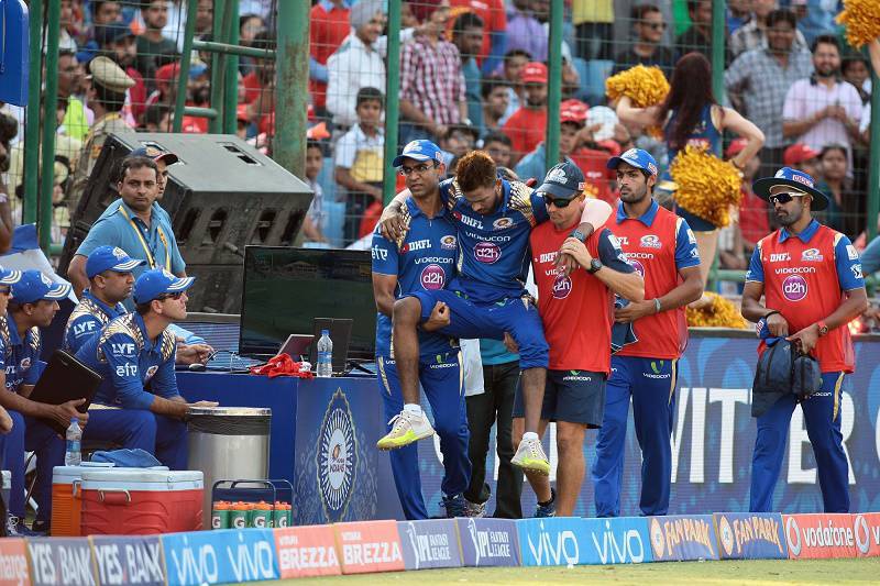 Hd Image for Cricket Mumbai Indians player Hardik Pandya being lifted off the field after he got inj