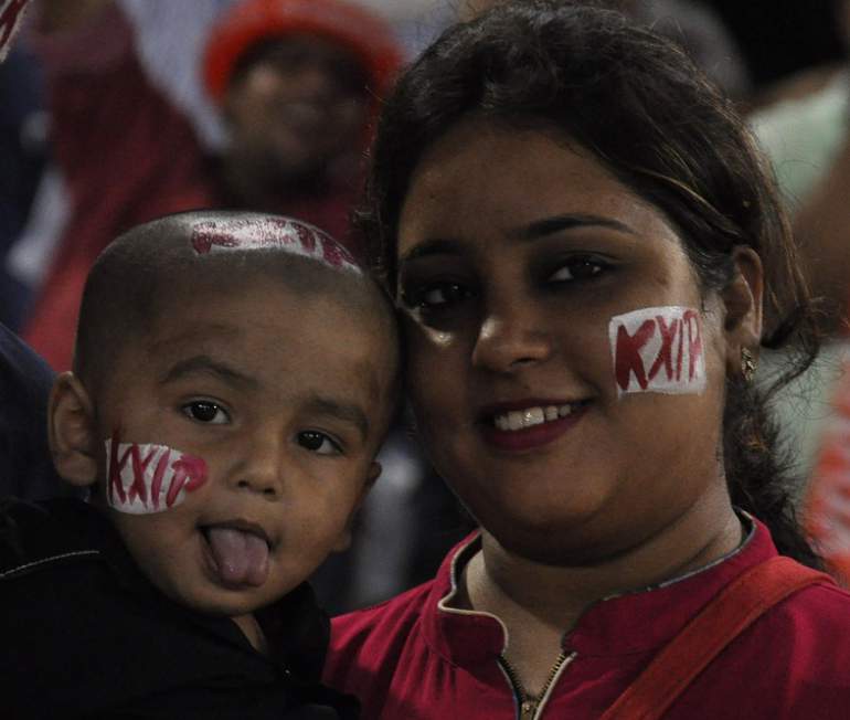 Fans cheer during Punjab and Bangalore match in Tamil