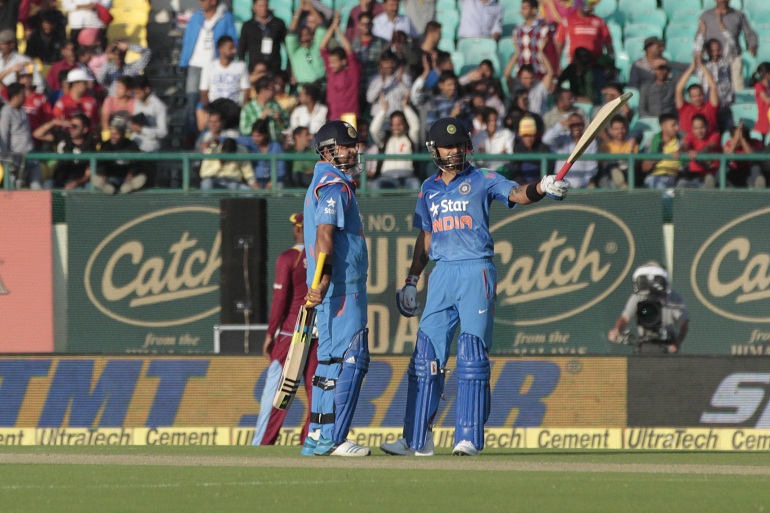 Indian Cricketer Virat Kohli Celebrates His Half Century