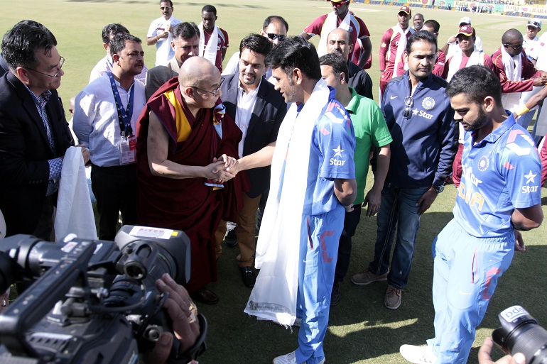 Indian captain MS Dhoni with Dalai Lama the spiritual head of Tibetan Buddhists in Tamil