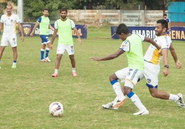 Mahendra Singh Dhoni Playing Football with Local Boys Image