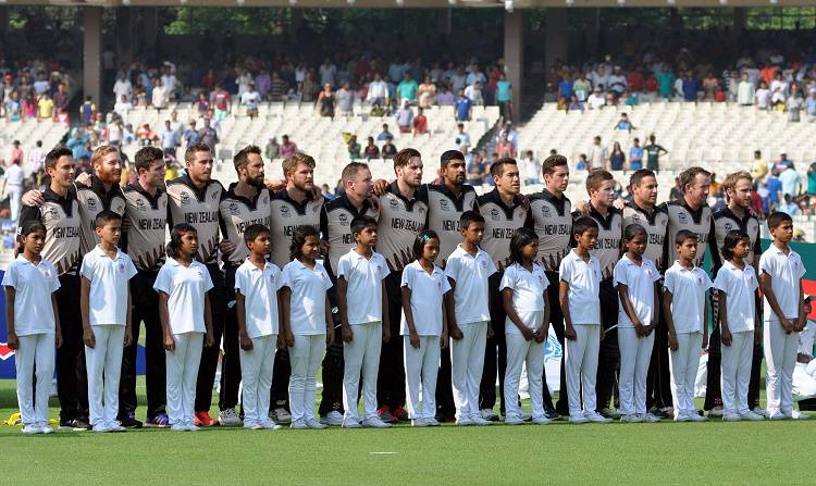 New Zealand players sing their national anthem ahead of a WT20 match in Tamil