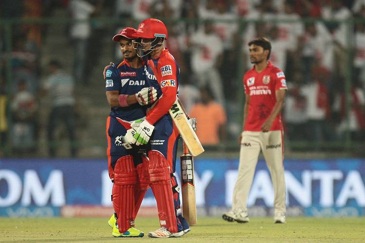 Pawan Negi and Quinton de Kock celebrates after winning the match in Tamil