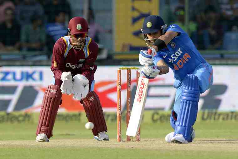 Virat Kohli Plays a Shot During 2nd ODI in Tamil