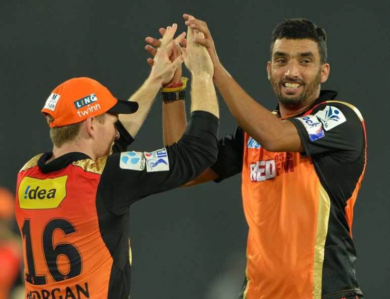 Sunrisers Hyderabad celebrate fall of a wicket in Tamil