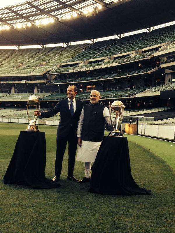 Prime Minister Narendra Modi and Australian PM Tony Abbot pose in Tamil