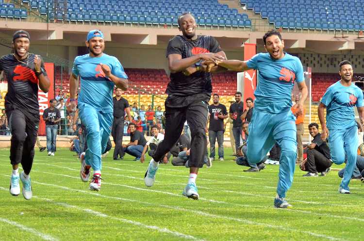 HD Image for cricket Usain Bolt, Yuvraj Singh and Harbhajan Singh during an exhibition match