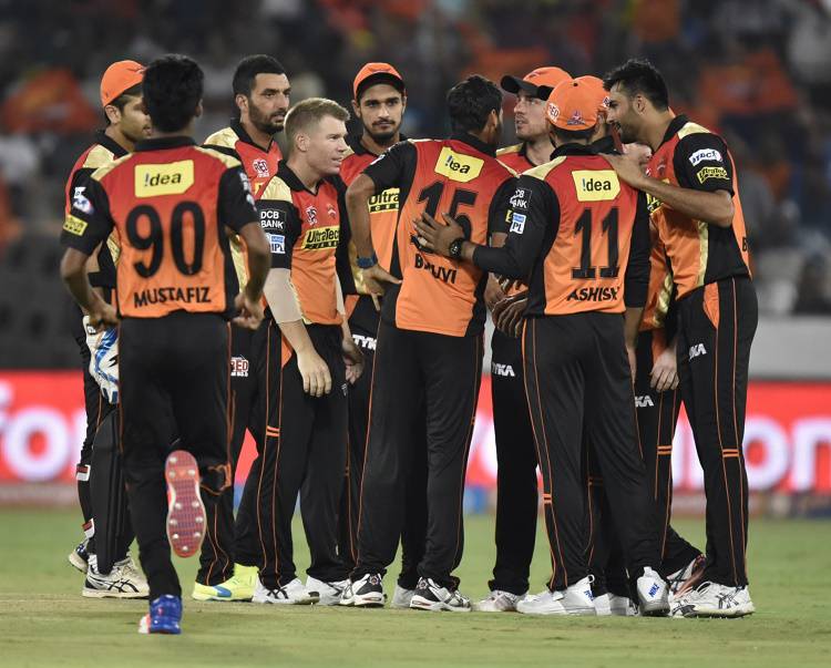 Sunrisers Hyderabad players celebrate fall of a wicket 