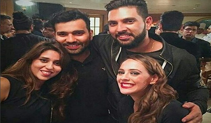 yuvraj singh hezal keech with rohit sharma Image